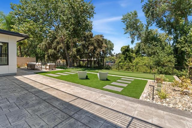 Backyard and putting green, photo 75 of 107