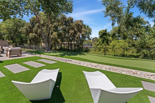 Backyard and putting green, photo 77 of 107