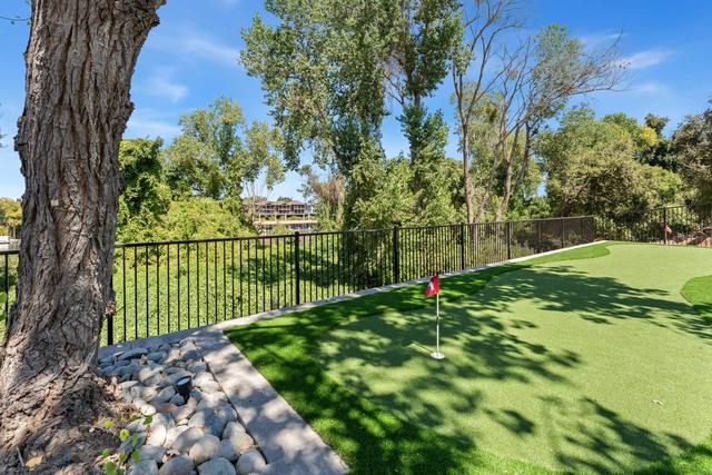 Backyard and putting green, photo 84 of 107